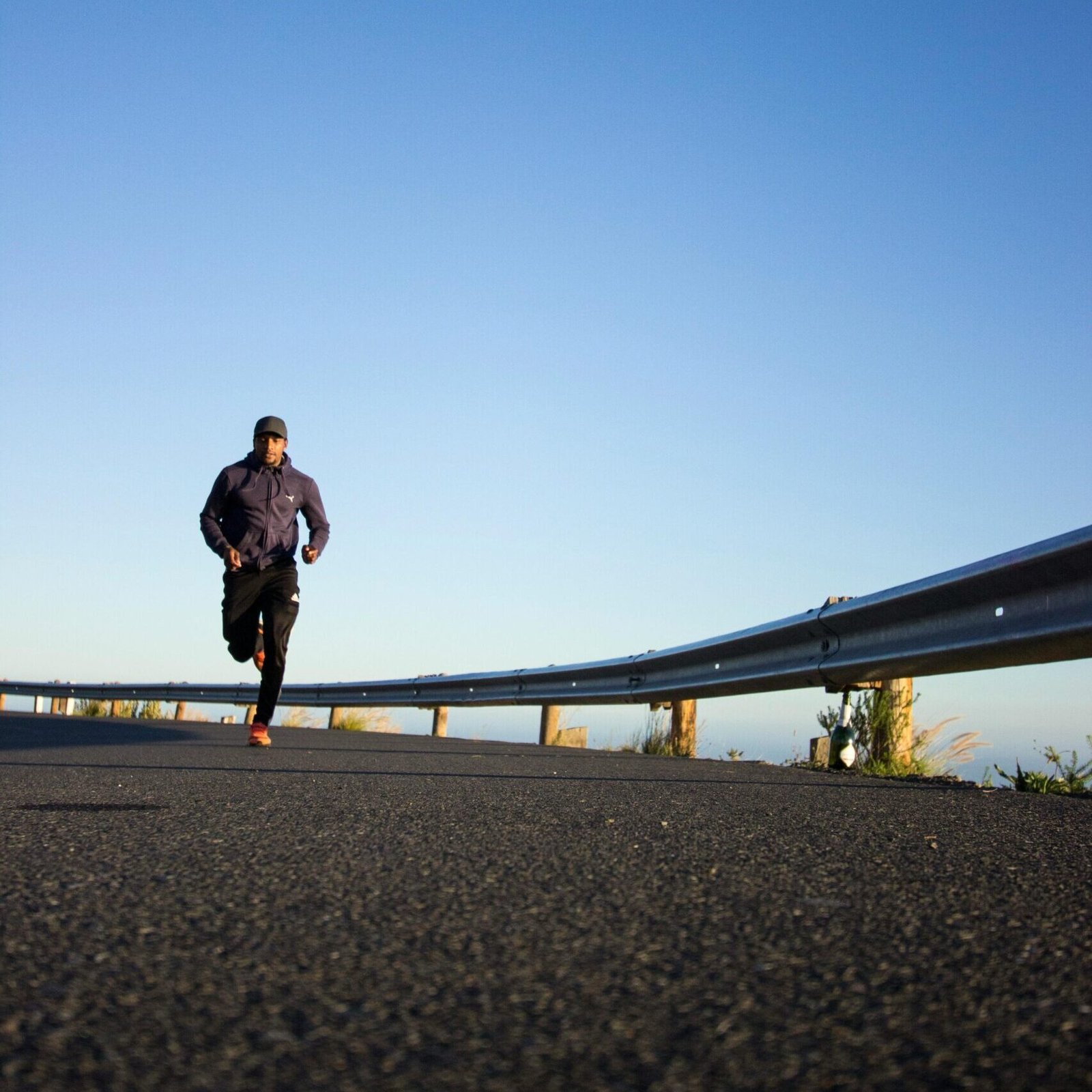 Photo Of Man Running During Daytime